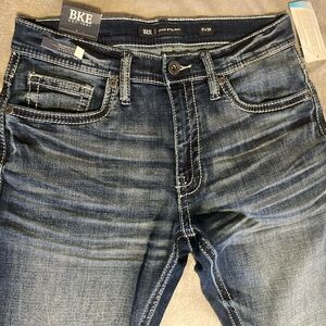 Dark blue buckle jeans